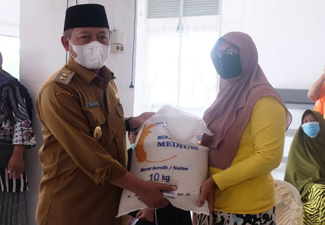 Plt Wali Kota Tanjungbalai Hadiri Launching Program Bantuan Beras PPKM